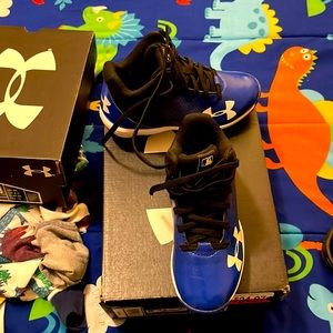 Need baseball cleats ! Size 11  Royal blue and Black Under Armour cleats